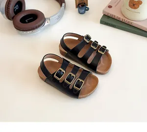 Sandales noires pour enfants style Birkenstock avec semelle en liège et brides