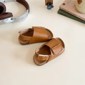 Girls' brown leather open-toe sandals with cork soles and woven edges for summer beach wear