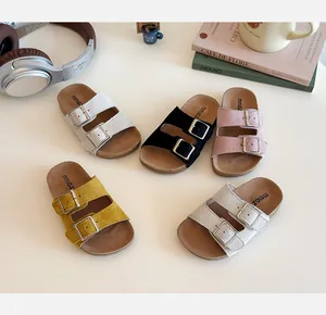 Detailed top view of kids' double-buckle sandals in five assorted vibrant colors