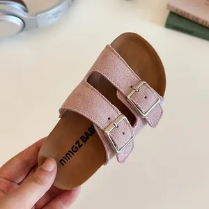 Pink girls double-buckle cork slippers with soft suede texture and adjustable straps