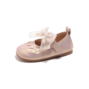 Pink pearl girl's princess flat shoes with ribbon bow and pearl details in full view