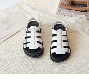 Top view of white woven cage sandals for girls with metallic buttons and adjustable straps
