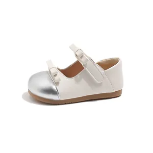 Girl's Mary Jane shoes in cream white with silver metallic toes and elegant bow details