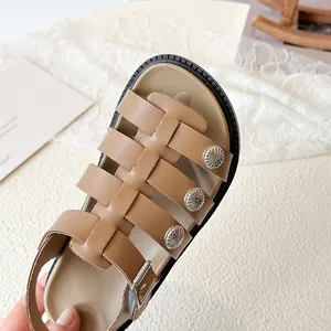 Brown leather girls sandals with silver floral buckles and vintage soft soles