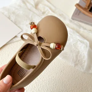 Brown girls' Mary Jane leather shoes with bow and decorative beads, soft toddler flat shoes