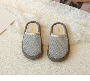 Detail of toddler princess hollow mesh slippers with embroidered insole and thick brown sole