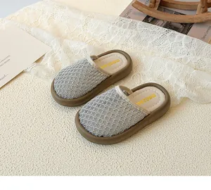 Detail of girls hollow breathable summer mule with thick non-slip sole and soft beige insole