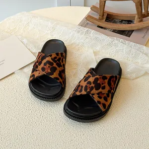 Kids' leopard print cross strap platform sandals with soft non-slip sole and warm tones