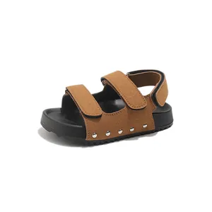 Kids open toe summer sandals in brown faux suede with velcro straps and rivets