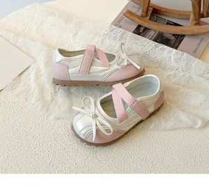 Detail of pink and silver Mary Jane sneakers for girls with lace bow and mesh panels
