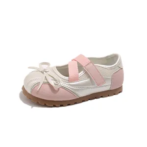 Pink and cream Mary Jane sneakers for girls with elastic straps and bow detail