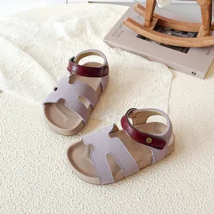 Girls purple H-cut summer sandals with maroon velcro straps and flat soles