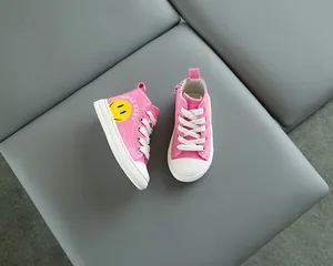 Scarpa alta in tela rosa per bambini con smiley giallo e cerniera laterale