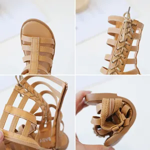 Roman style girls brown sandals with multi-layered straps and flexible rubber soles