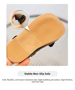 Close-up of flexible non-slip gum rubber sole with wavy traction patterns for girl's shoes