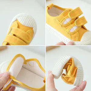 Chaussures en toile jaune pour enfants avec bandes velcro et semelle souple