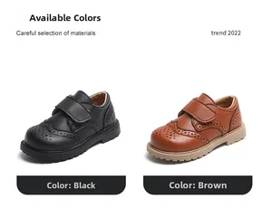 Classic kids brogue shoes with velcro straps in matte black and brown leather options