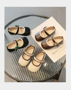 Three pairs of Mary Jane baby shoes with scalloped edges and 3D flower details