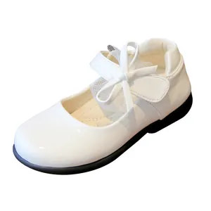 Girls' white Mary Jane shoes with bow decoration and mesh trim on black rubber sole