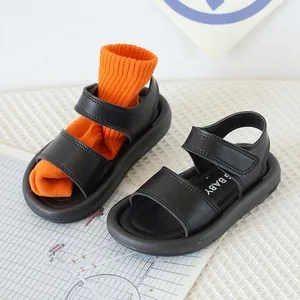 Sandales minimalistes noires pour enfants avec bandes velcro et semelle souple été