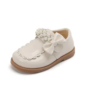 Girls patent leather princess shoes with pearls and rhinestones in cream beige