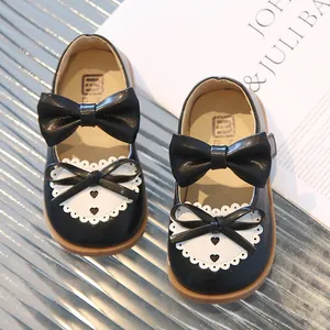 Chaussures Mary Jane en cuir noir pour filles avec dentelle cœur et double nœud