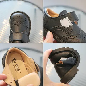British style black leather shoes for kids with brogue cutout and flexible soft sole