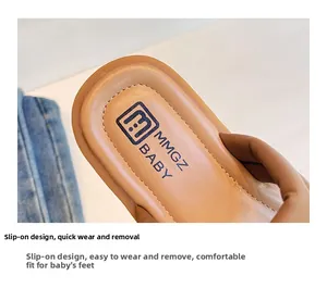 Detail view of girls slip-on sandals with soft leather insole and handmade stitching
