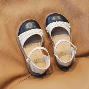 Scarpe Mary Jane da bambina in nero e beige con perline e suole in gomma antiscivolo