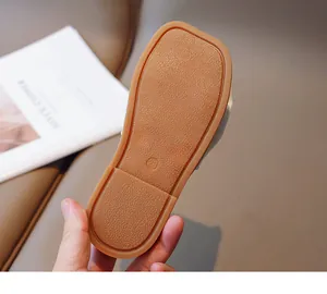 Detail view of anti-slip rubber sole for children sandals featuring size 28 marking