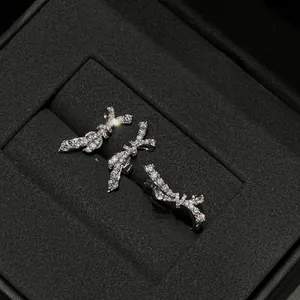 Elegant silver bow jewelry set with zircon inlay in a premium black display gift box