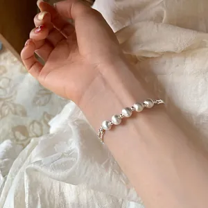 Elegant brushed silver beaded bracelet for women featuring minimalist matte round beads