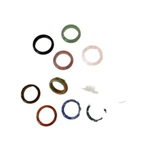 Assorted natural stone rings set including obsidian rose quartz and lapis lazuli rings