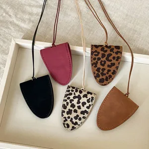 Leopard print and solid color faux suede magnetic sunglasses holder necklace set