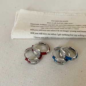 Micro-pave zircon horseshoe hoop earrings with red and blue oil drip enamel finish