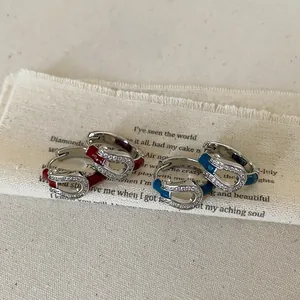 Unique horseshoe hoop earrings with red and blue enamel and zircon inlay accents