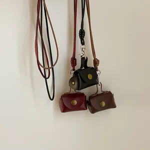 Mini collier porte-monnaie en cuir vintage pour écouteurs en noir, bordeaux et marron