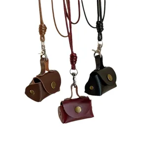 Mini collier pendentif porte-monnaie vintage en cuir avec cordon tressé et fermoir