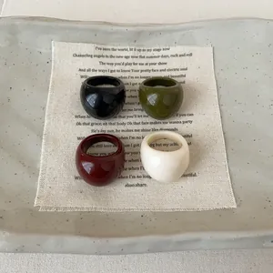 Minimalist resin oval chunky rings set in black green red and cream white colors