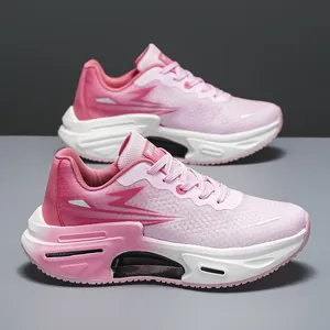 Pink breathable mesh running shoes for women with cushioned soles and sporty lace-up style
