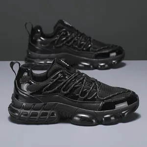 Macro shot of black mesh and patent leather sneakers with transparent bubble chunky soles