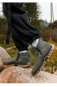 Water-repellent olive green winter hiking boots with warm fleece lining and side zipper