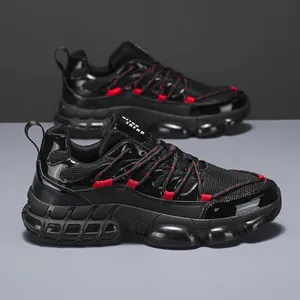Detail of black breathable mesh and red lace accents on retro trend platform sneakers