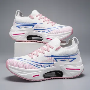 Detail of breathable knit mesh fabric and vibrant pink laces on cushioned running shoes