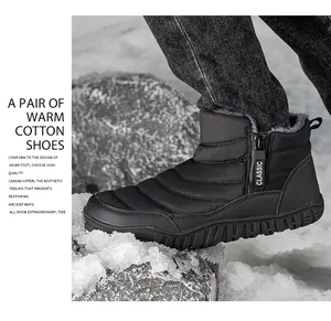 Detail of warm black snow boot showing the thick grey faux fur lining and side zipper
