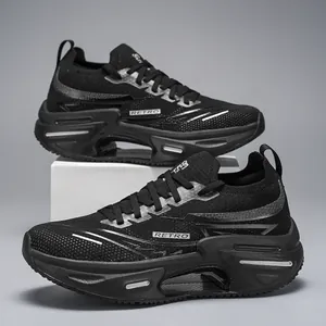 Detail view of the breathable mesh upper and RETRO lettering on these black running shoes
