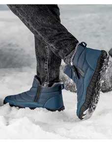 Detail view of water-resistant blue snow boots with side zipper and warm faux fur lining
