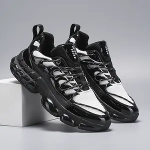 Close-up of mesh fabric and Retro Trend logo on black and white chunky sneakers