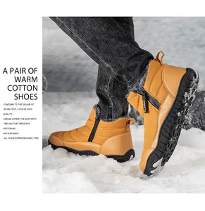Detailed view of yellow winter boots with warm grey fur lining and classic side zipper