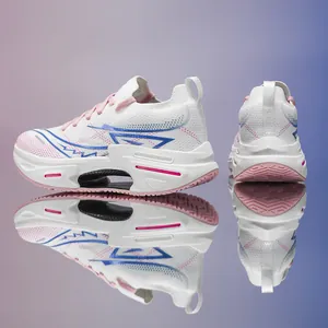 Detail of white running shoes with pink laces and high-elastic cushioned sole